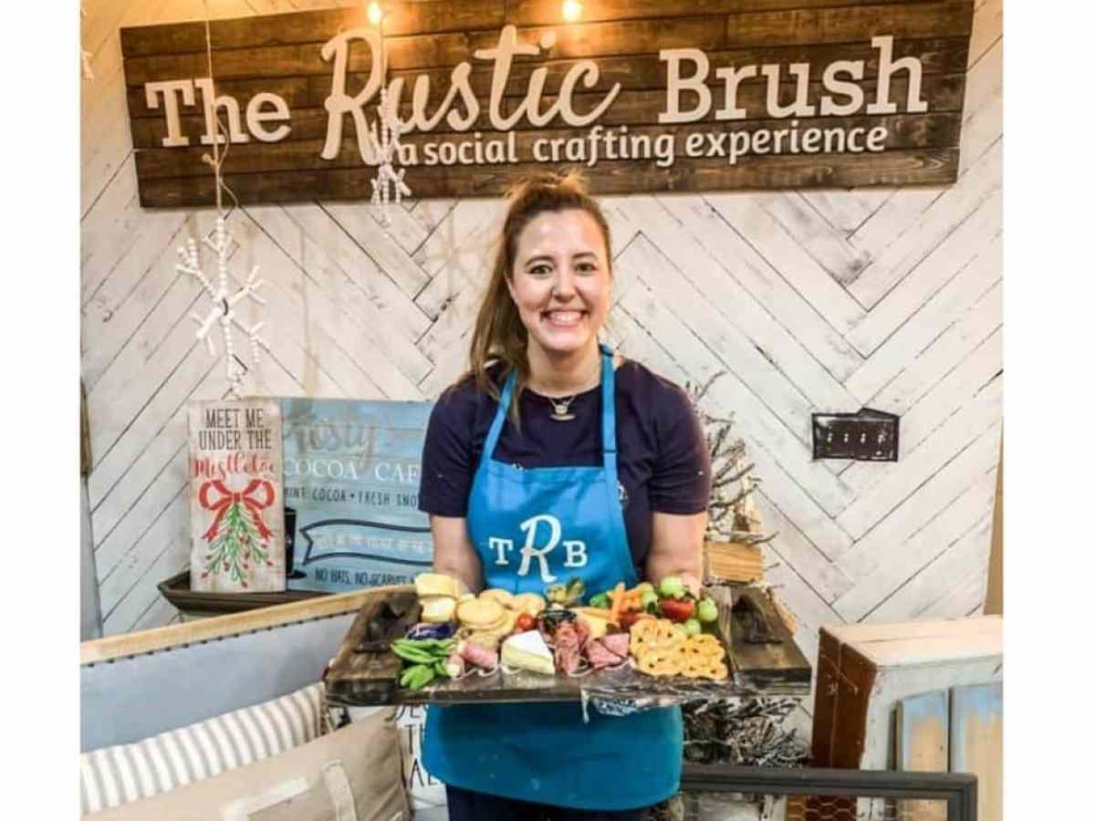 a person standing in front of a box