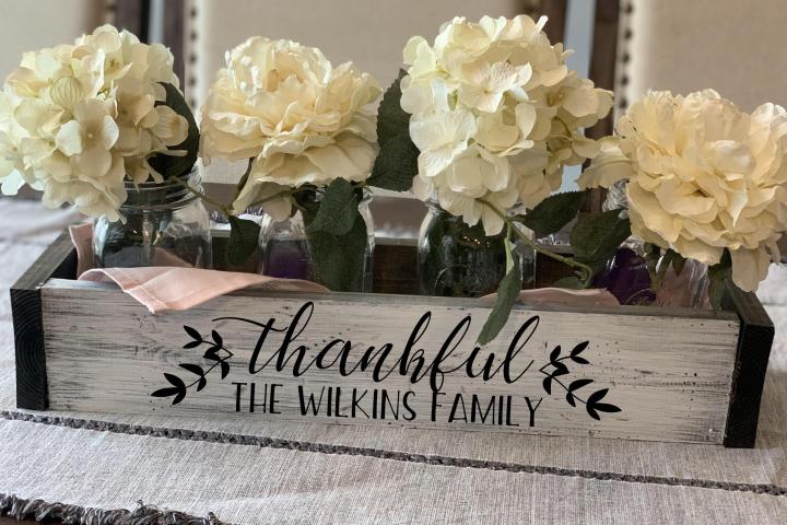 a vase of flowers on a table