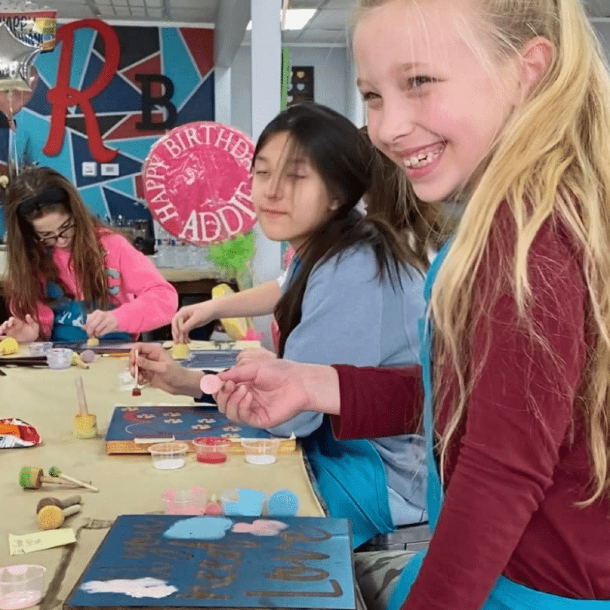 a group of people sitting at a table