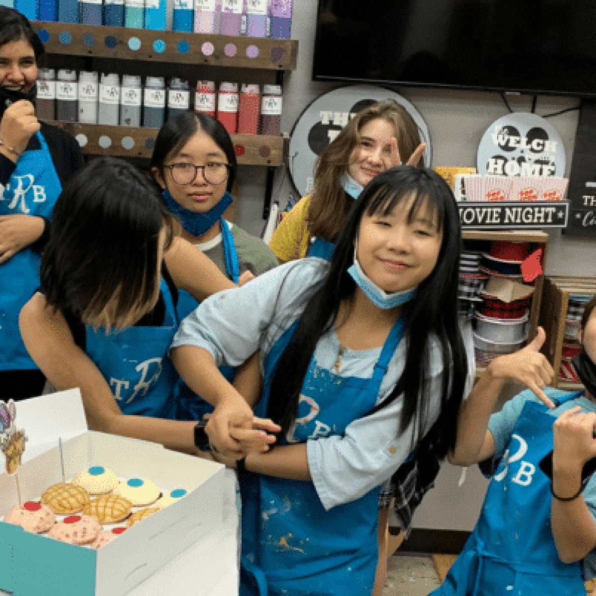 a group of people posing for the camera