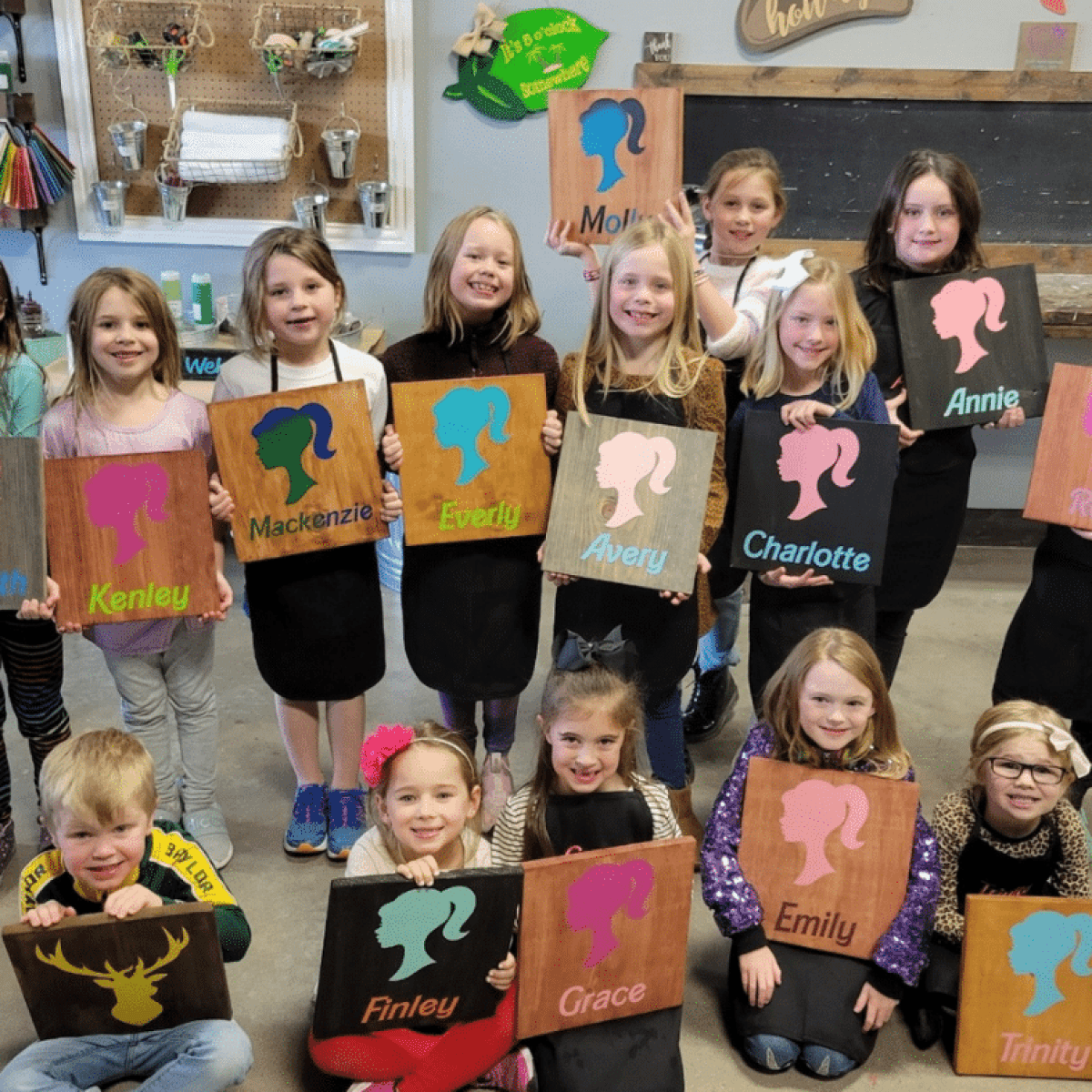 a group of kids posing for a photo