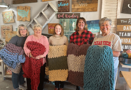 a group of people posing for the camera