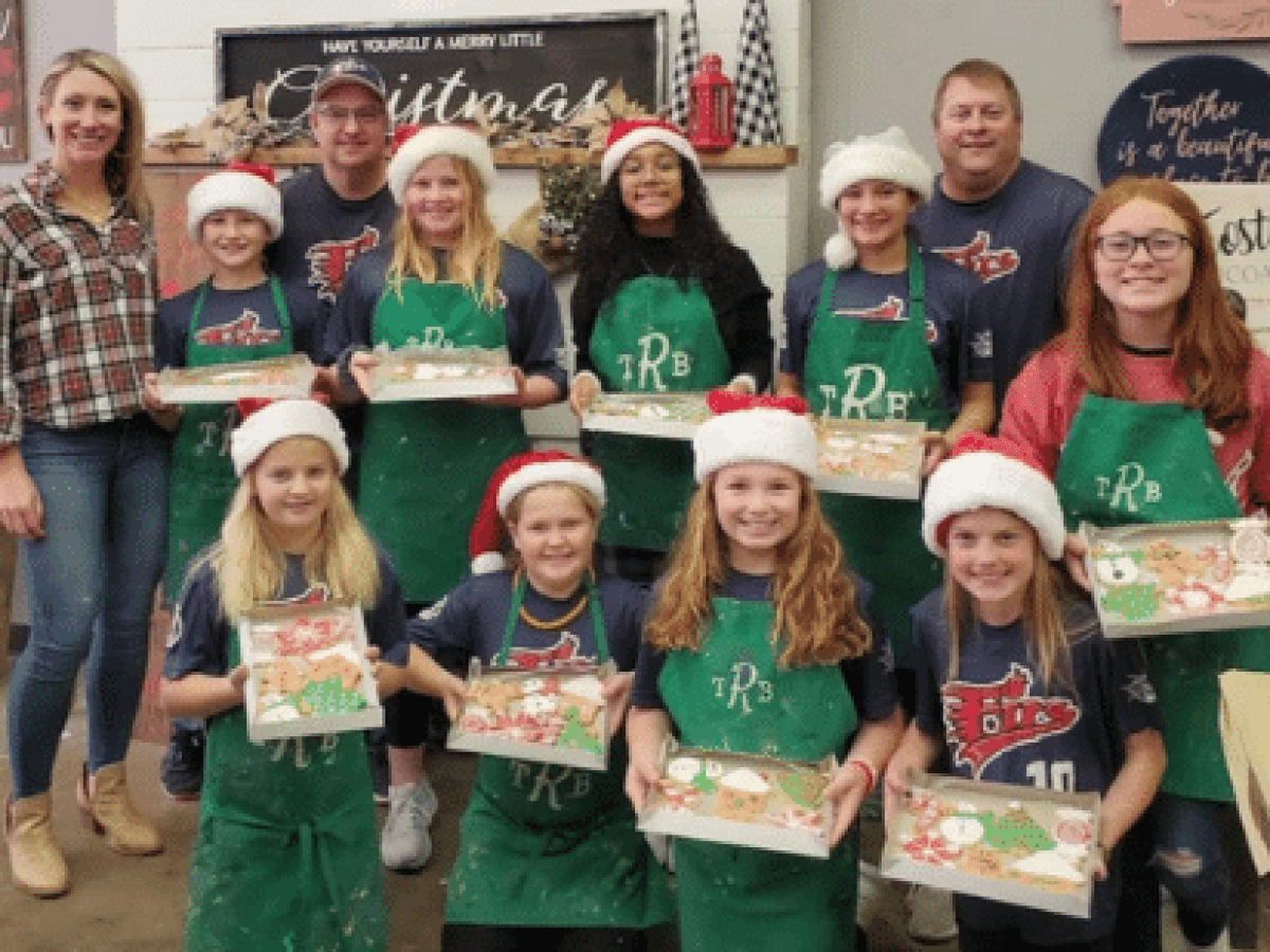 a group of people posing for a photo