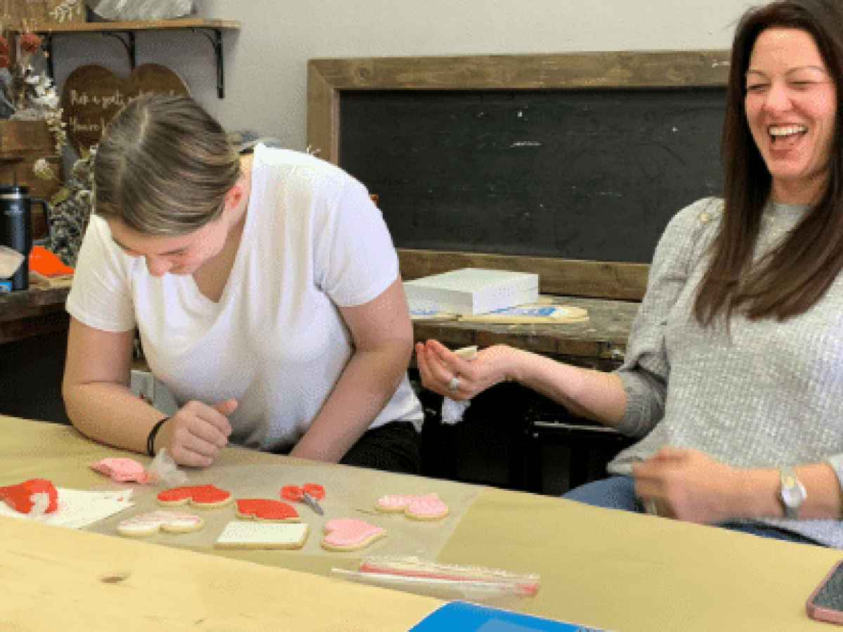 a group of people sitting at a table