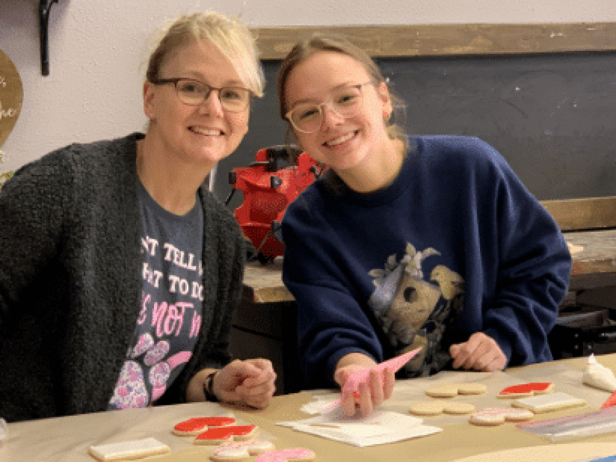 a woman sitting at a table