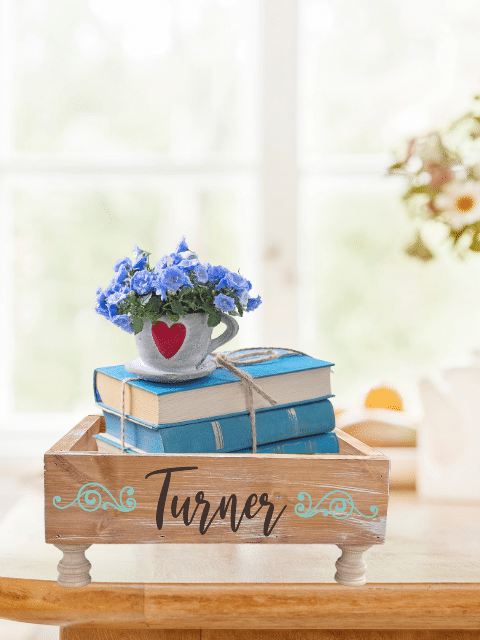 a train cake sitting on top of a wooden table