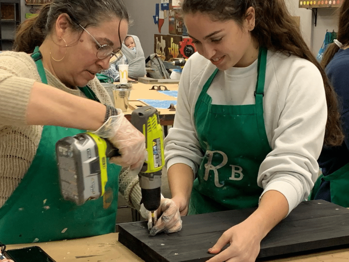 a woman sitting at a table