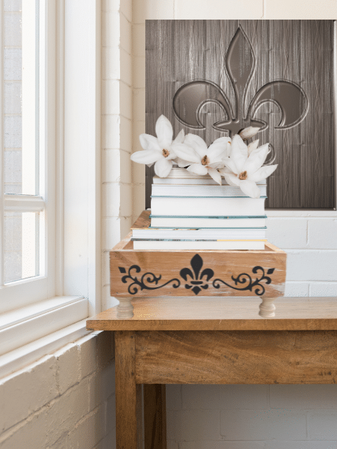 a vase with flowers in front of a window