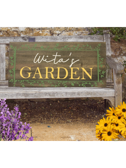 a sign on a wooden bench