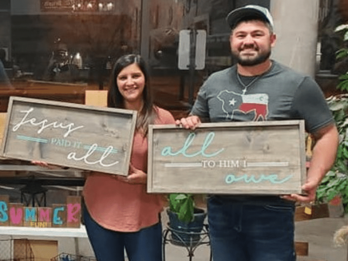 a person standing in front of a store
