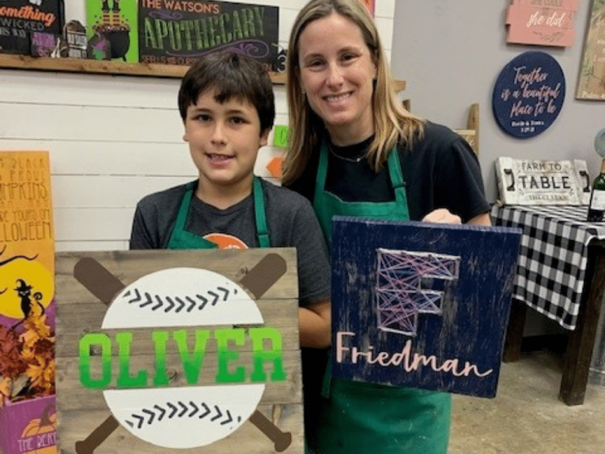 a person holding a sign