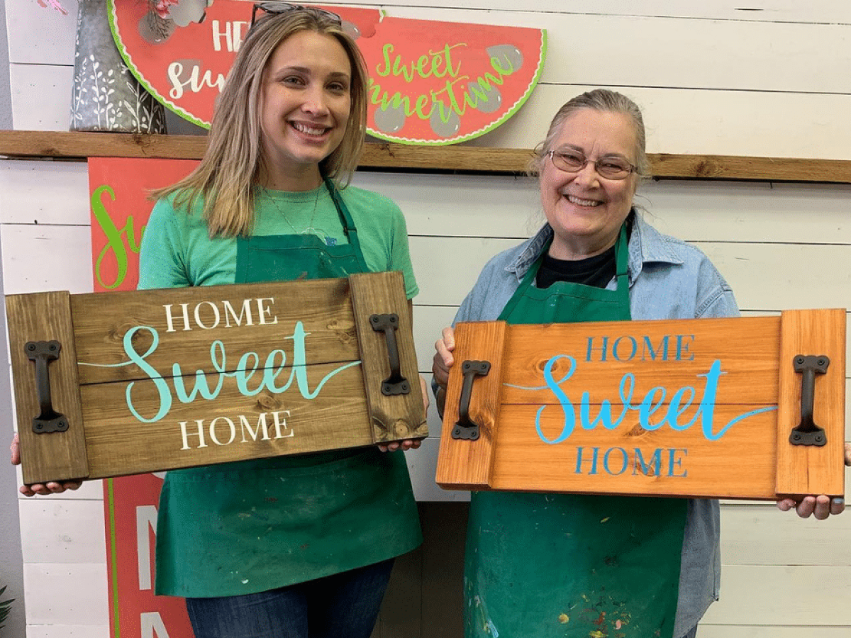 a person holding a sign