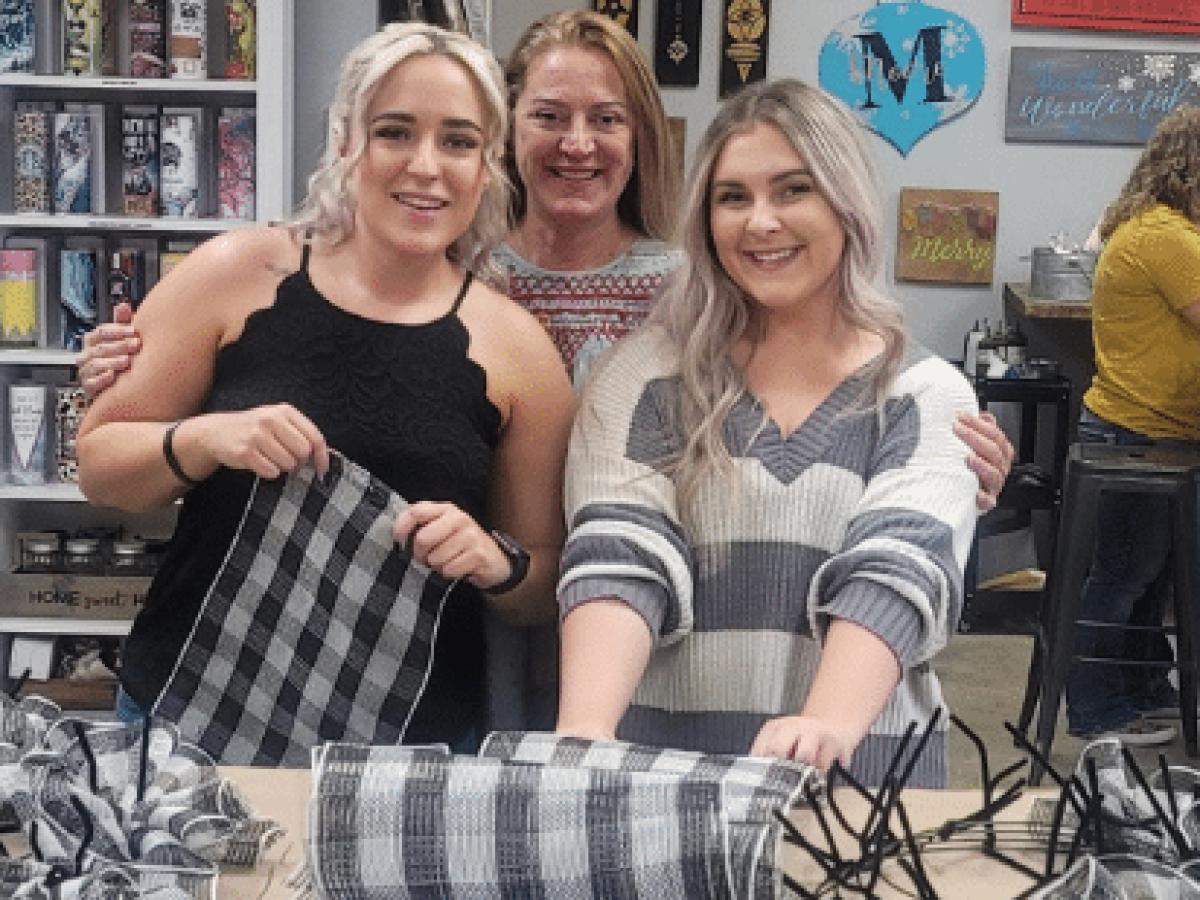 a group of people posing for the camera