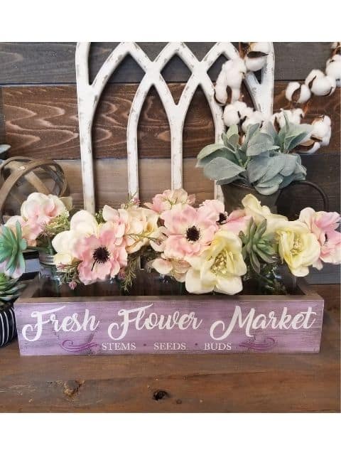 a vase of flowers on a table