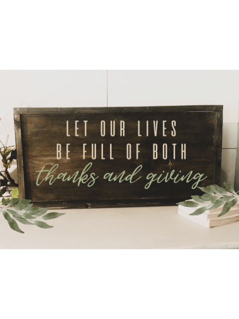 a sign on a wooden table