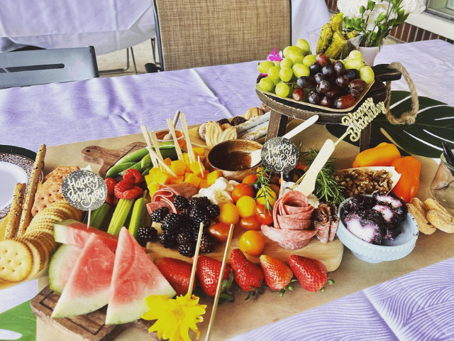 a table topped with different types of food on a plate