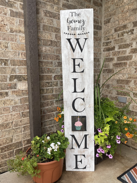 a sign in front of a brick building