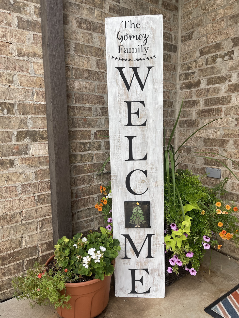 a sign in front of a brick building