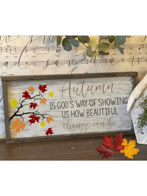 Wooden sign with autumn quote, colorful leaves, and musical note background.