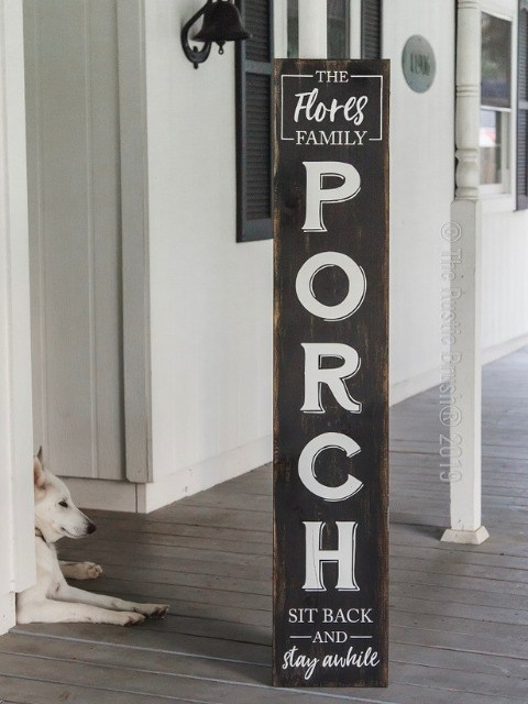 Personalized vertical wooden porch sign featuring a family name and welcoming “PORCH” message.